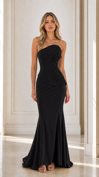 Front view of black strapless beaded mermaid evening dress