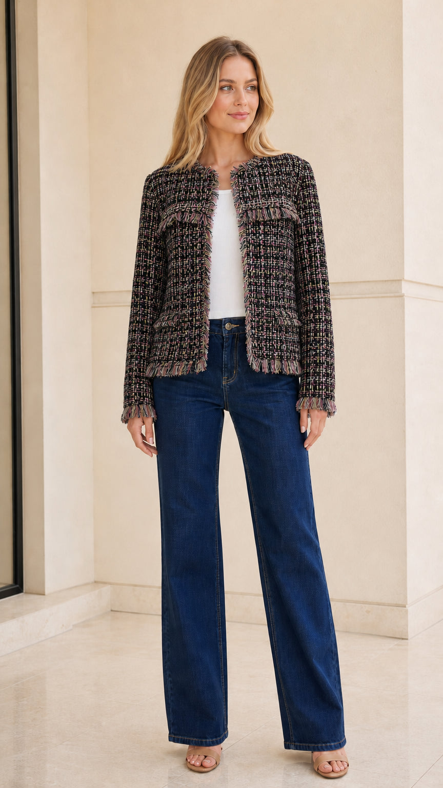 Model wearing black tweed jacket front view