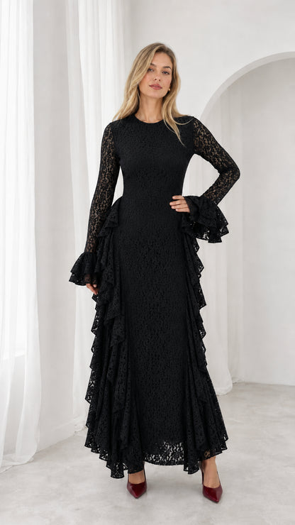 Front view of black floral lace long sleeve maxi evening gown with ruffle trim