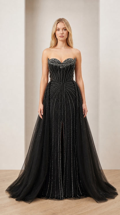Front view of Black embellished strapless ball gown