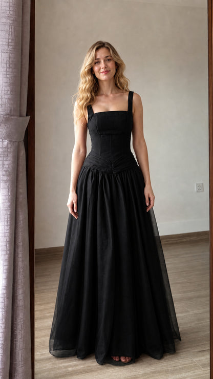Front view of black corset-style long tulle evening gown