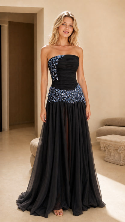 Front view of black strapless embellished evening gown