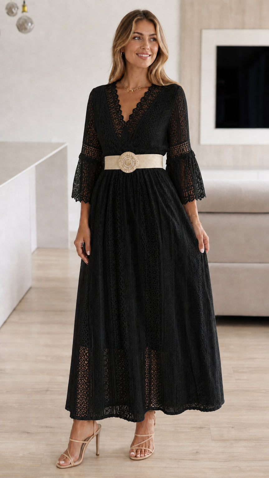 Model wearing black lace maxi dress with woven belt