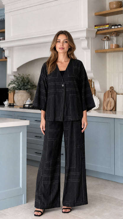 Model wearing Black 2-piece V-neck wide-leg pants set