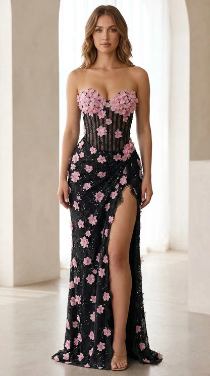 Front view of black 3D floral strapless maxi dress