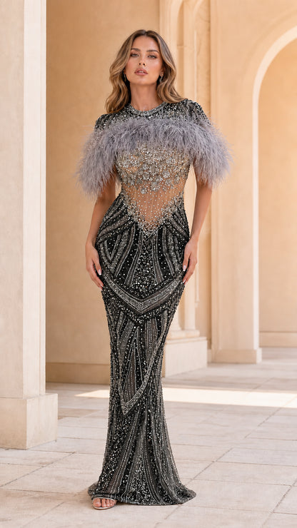 Model wearing Black beaded feather capelet formal evening gown