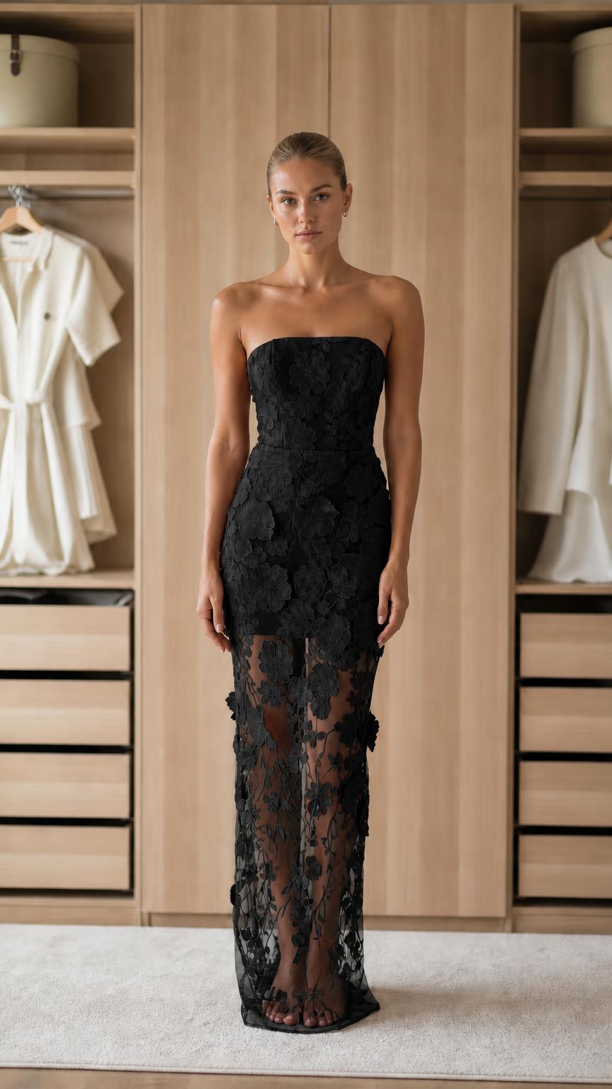 Front view of black strapless floral applique maxi dress