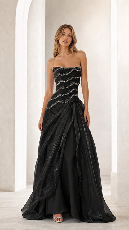 Black strapless beaded evening gown with draped overlay