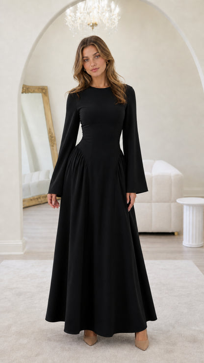 Front view of model wearing black long-sleeve maxi dress