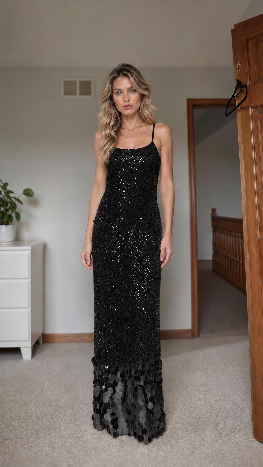 Front view of black sequin maxi dress