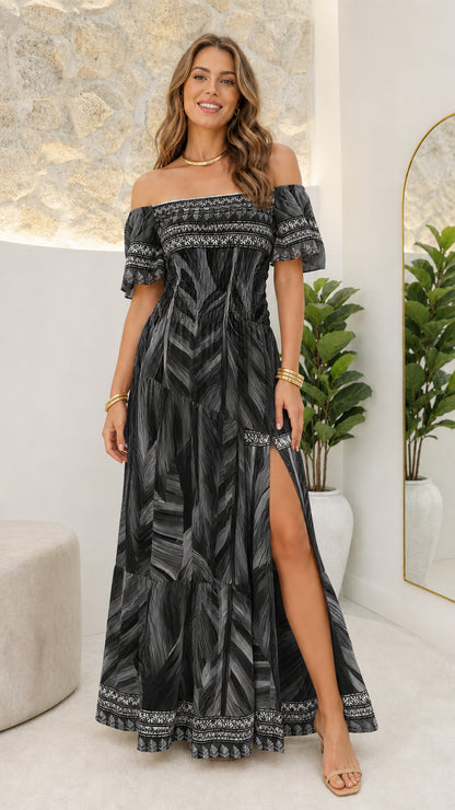 Front view of woman wearing black boho maxi dress