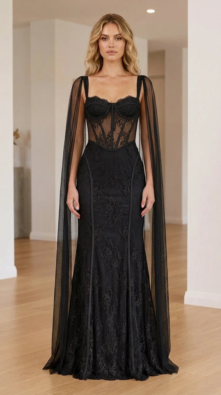 Front view of the black cape corset maxi dress