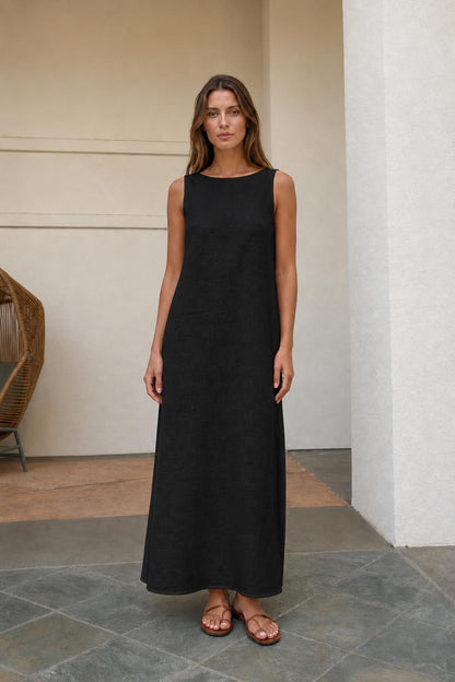 Woman wearing black sleeveless maxi dress