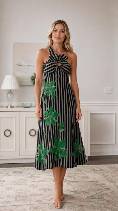 Front view of black striped halter midi dress