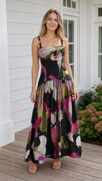 Model wearing black watercolor floral maxi dress