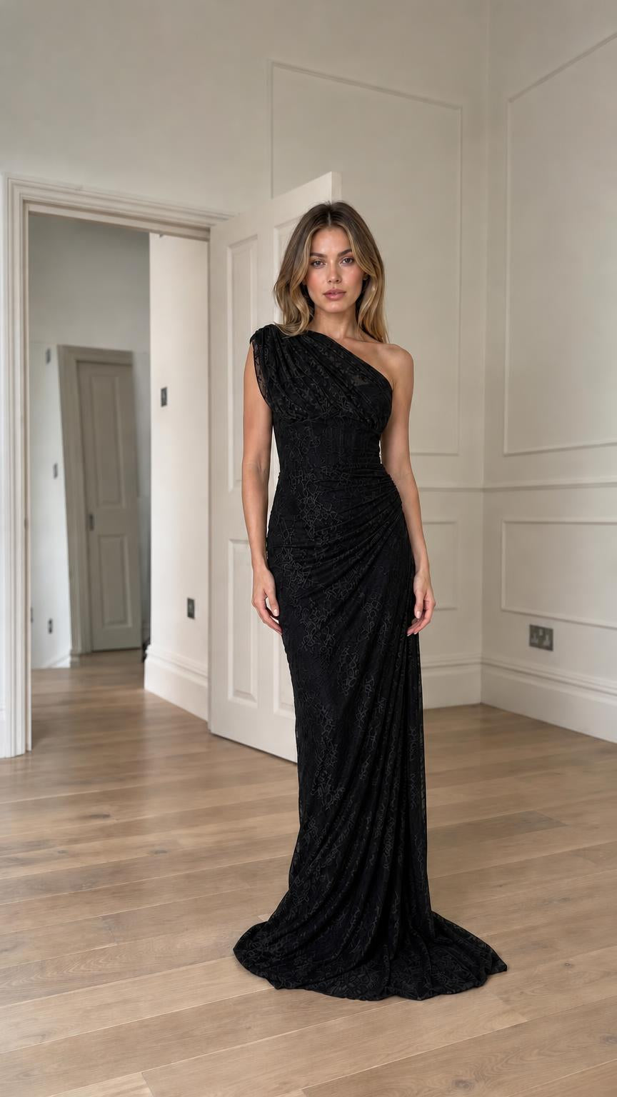 Model wearing black one-shoulder evening gown