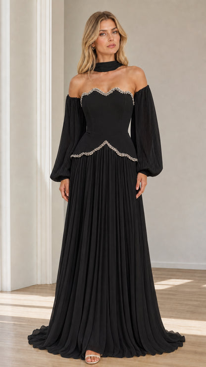 Front view of black off-the-shoulder beaded scalloped pleated maxi evening gown