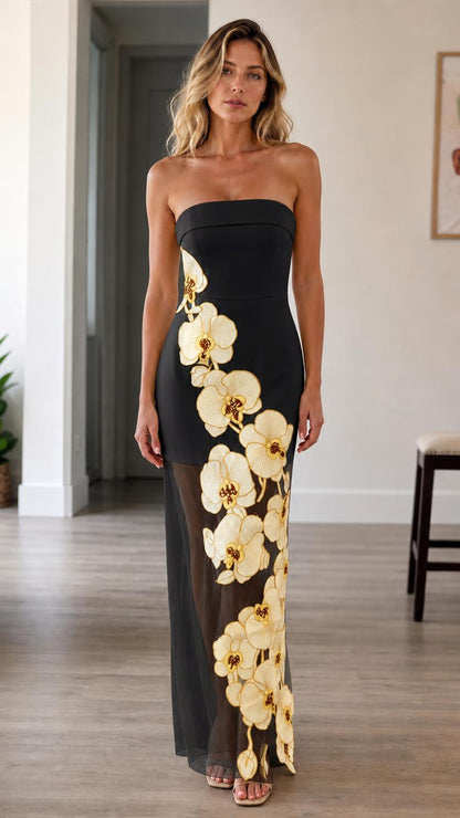 Front view of black strapless 3d floral maxi dress