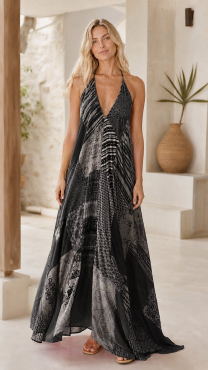 Model wearing black patterned boho maxi dress