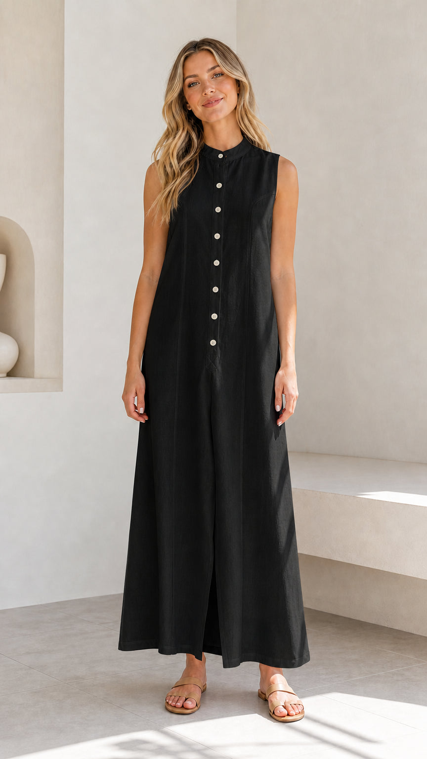Full view of a woman wearing a black sleeveless button-down maxi dress