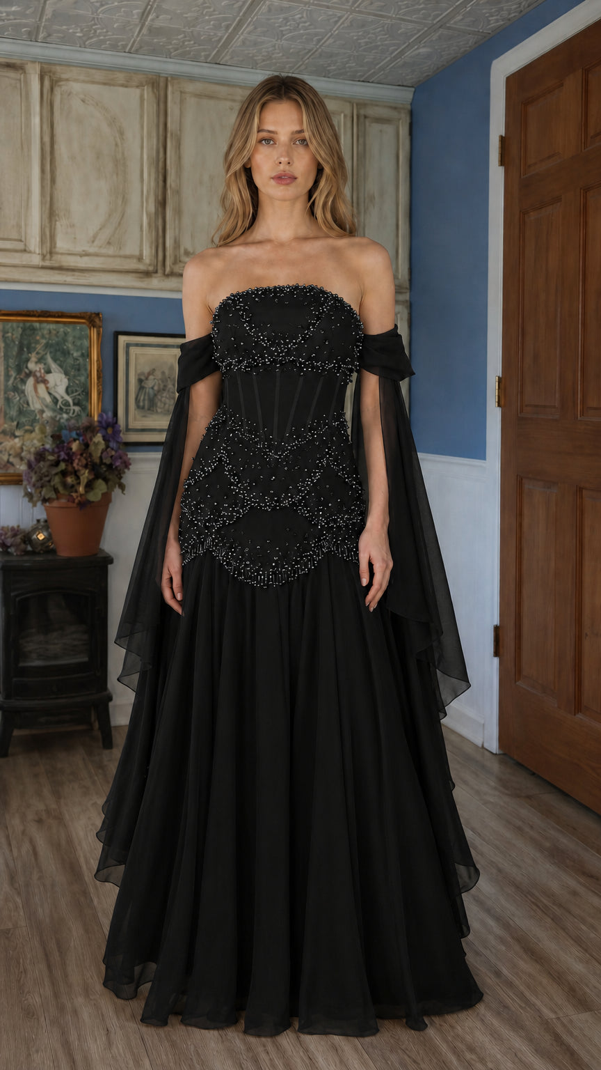Front view of black beaded off-shoulder evening gown