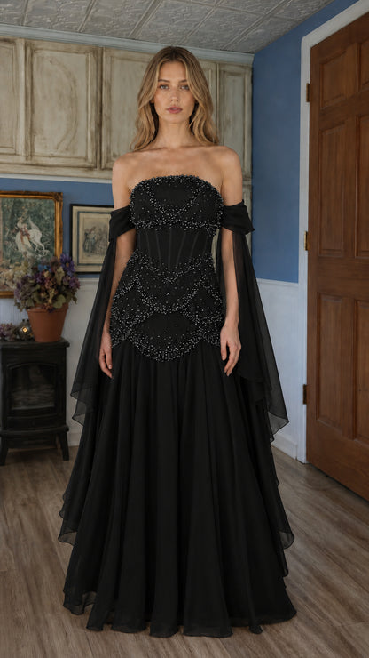 Front view of black beaded off-shoulder evening gown