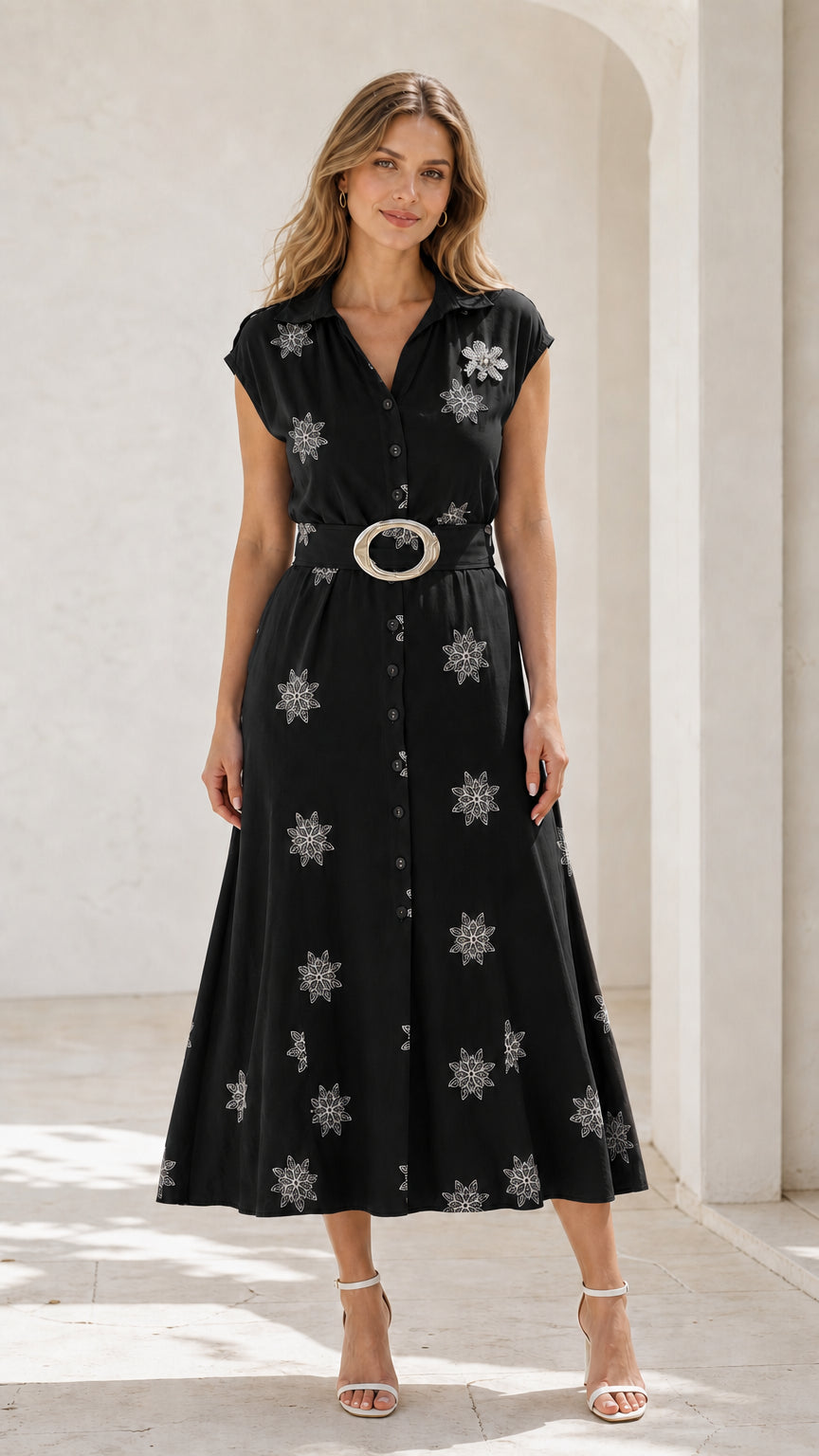 Front view of black embroidered belted midi shirt dress