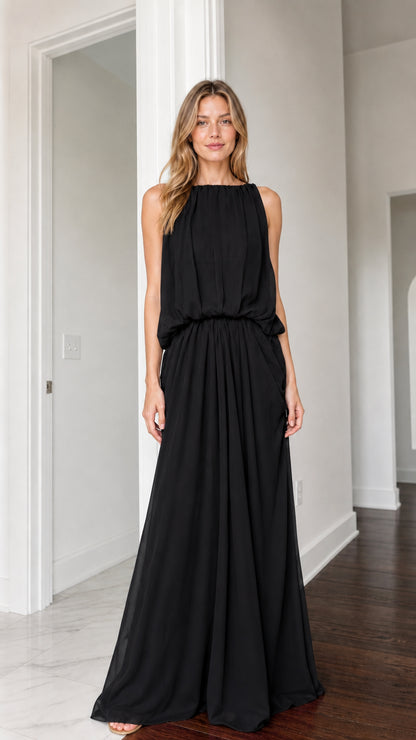 Front view of woman wearing black high neck sleeveless maxi dress