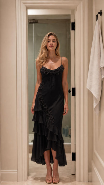 Model wearing black color variant of the floral ruffle slip dress