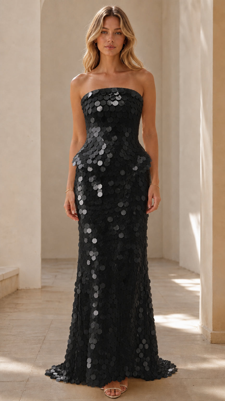 Front view of Black strapless sequin peplum maxi dress