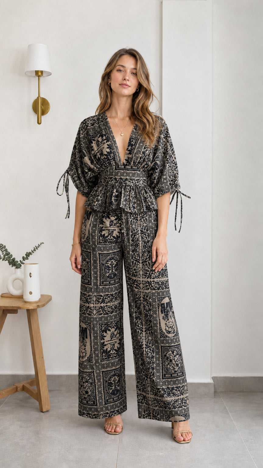 Model wearing black printed two-piece set