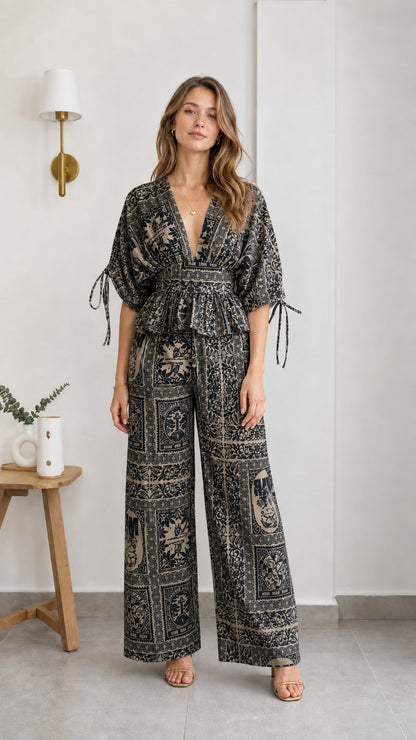 Model wearing black printed two-piece set