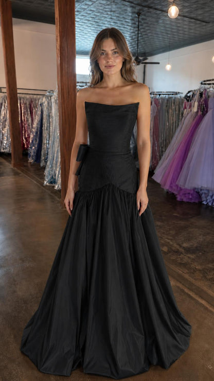 Front view of black strapless evening gown