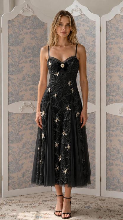 Front view of Black floral embroidered tulle midi dress