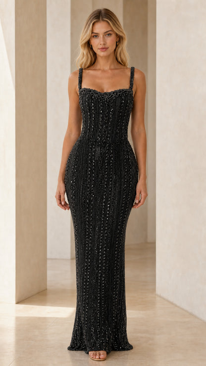 Model wearing Black beaded knit corset maxi evening gown