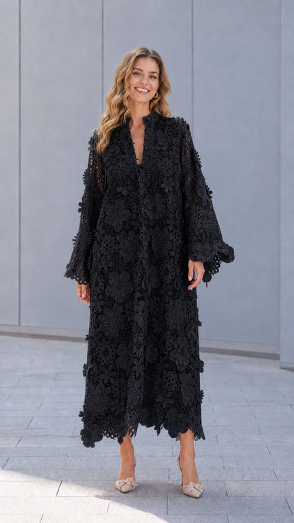 Model wearing black floral lace maxi dress