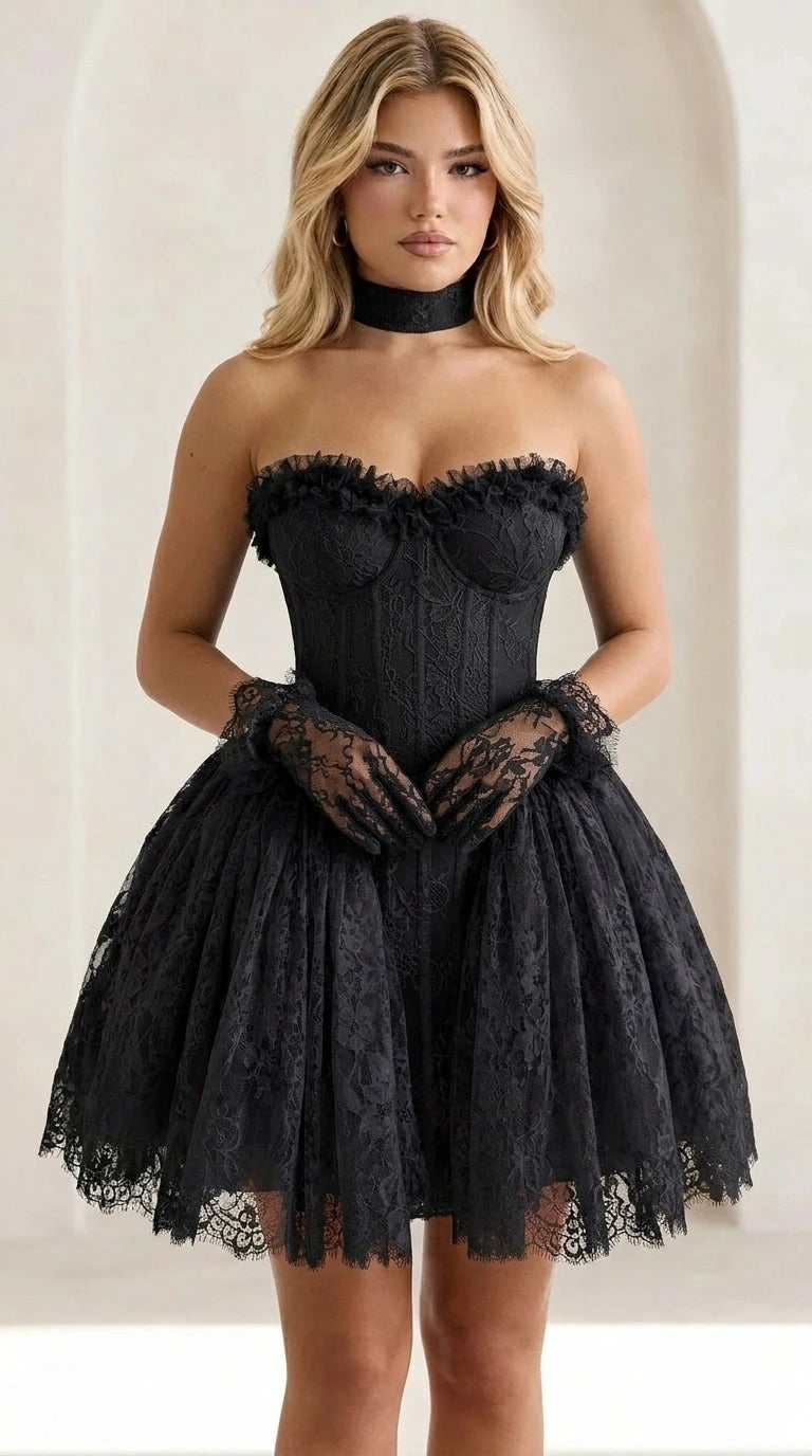 Front view of model wearing black lace corset mini dress