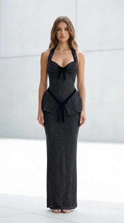 Front view of black glitter halter maxi dress
