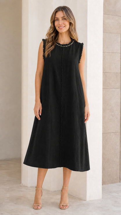 Front view of woman wearing black sleeveless midi dress