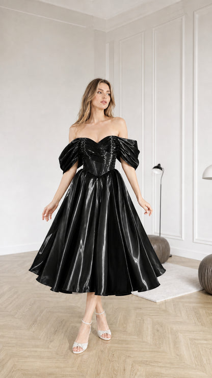 Front full view of black metallic off-shoulder cocktail dress
