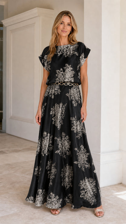 Model wearing Black floral embroidered maxi dress