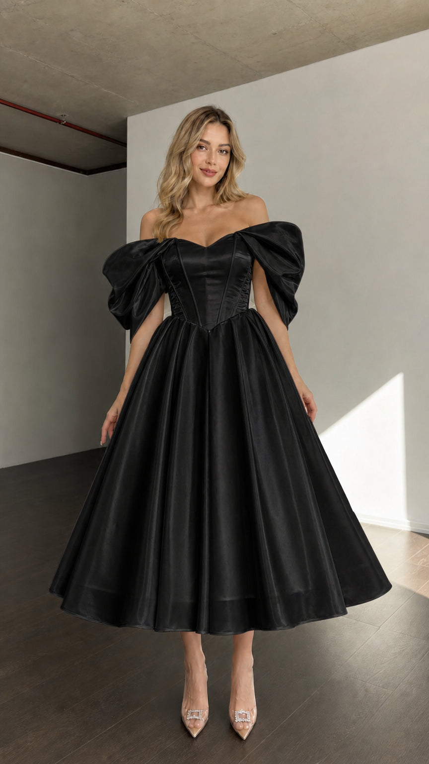 Front view of woman wearing black off-shoulder corset midi dress