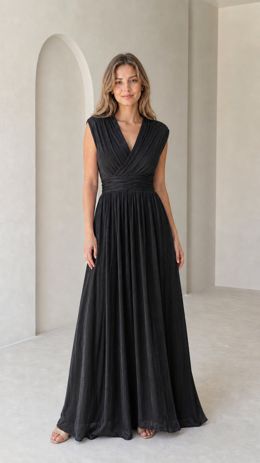 Model wearing black pleated V-neck formal sleeveless maxi dress