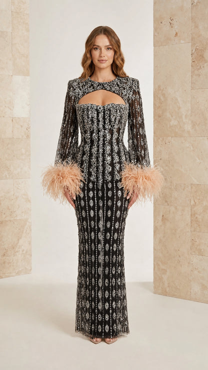 Black beaded long sleeve formal gown with keyhole cutout and feather cuffs