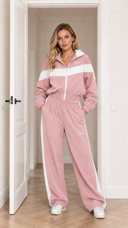 Model wearing Dusty Pink colorblock zip-up jacket and wide-leg sweatpants set