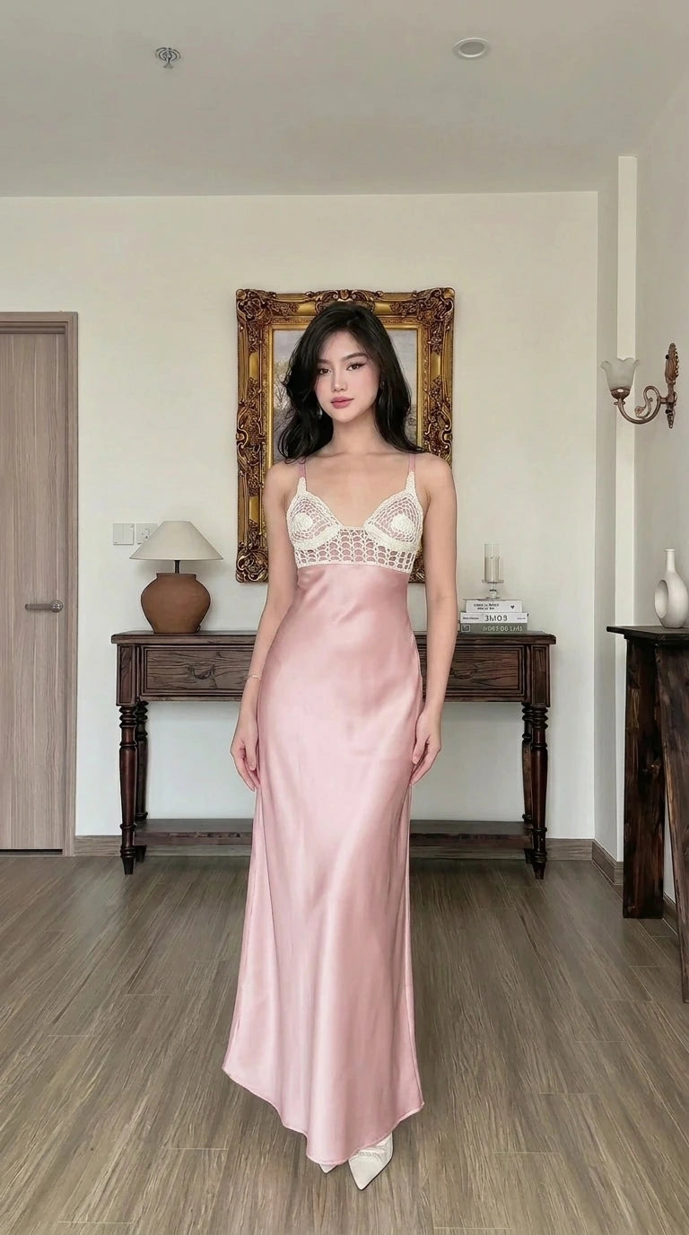 Woman wearing pink satin maxi slip dress with crochet contrast