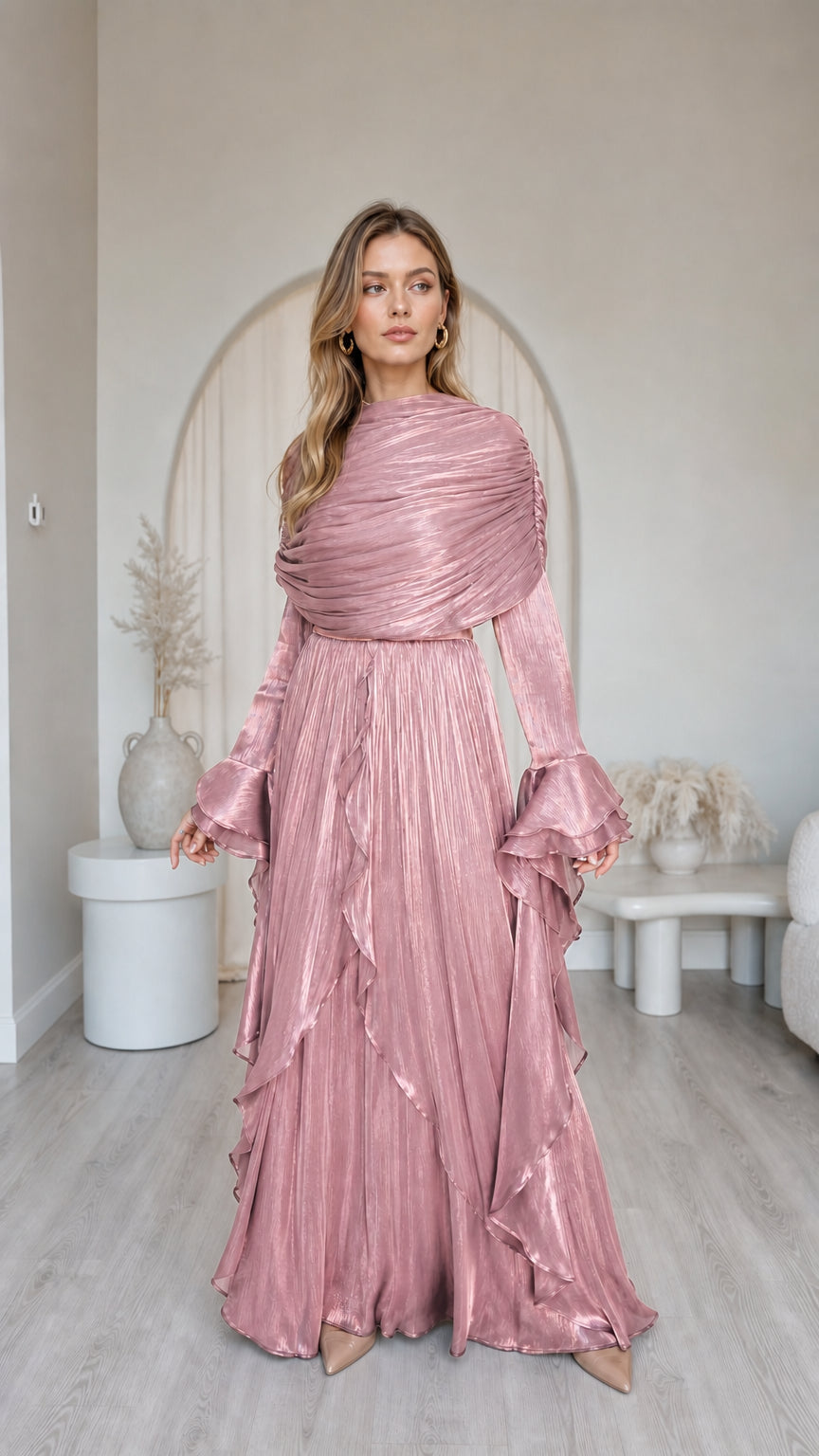 Front view of model wearing metallic pink pleated long sleeve maxi dress