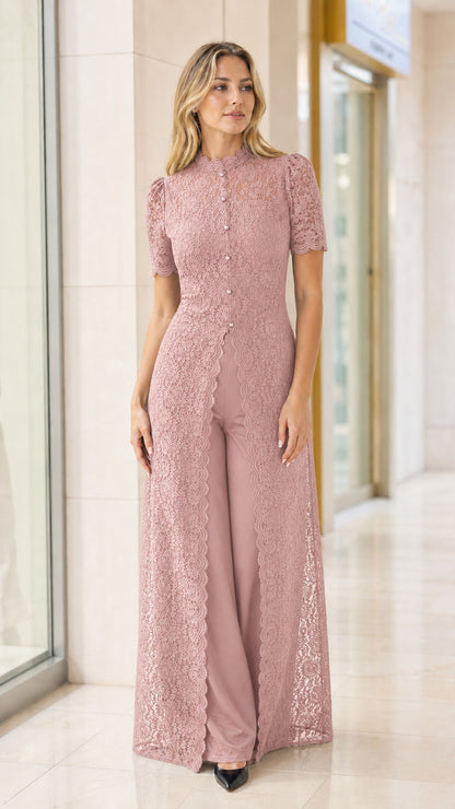 Model wearing dusty rose lace overlay wide-leg formal pantsuit