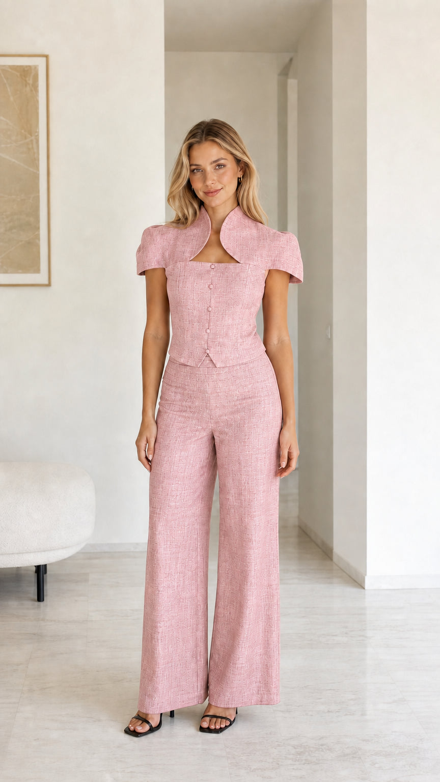 Model wearing pink color variant of two-piece set
