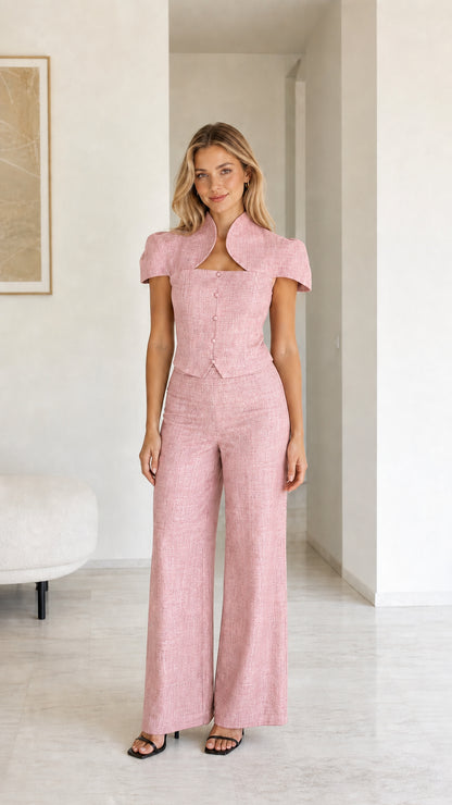 Model wearing pink color variant of two-piece set